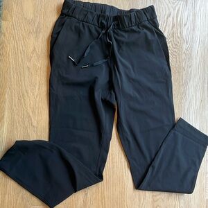 Lululemon On The Fly 7/8 Pant Black size 4